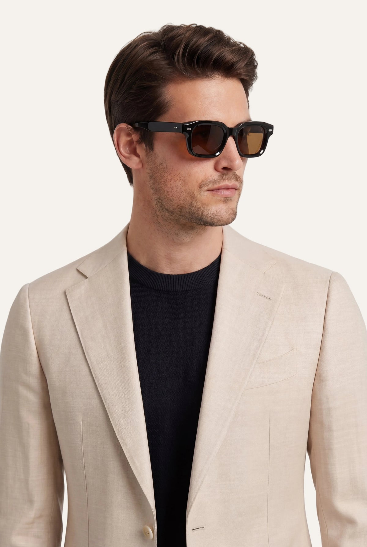 Zane Barläs Oxford Beige Suit — portrait editorial view on model