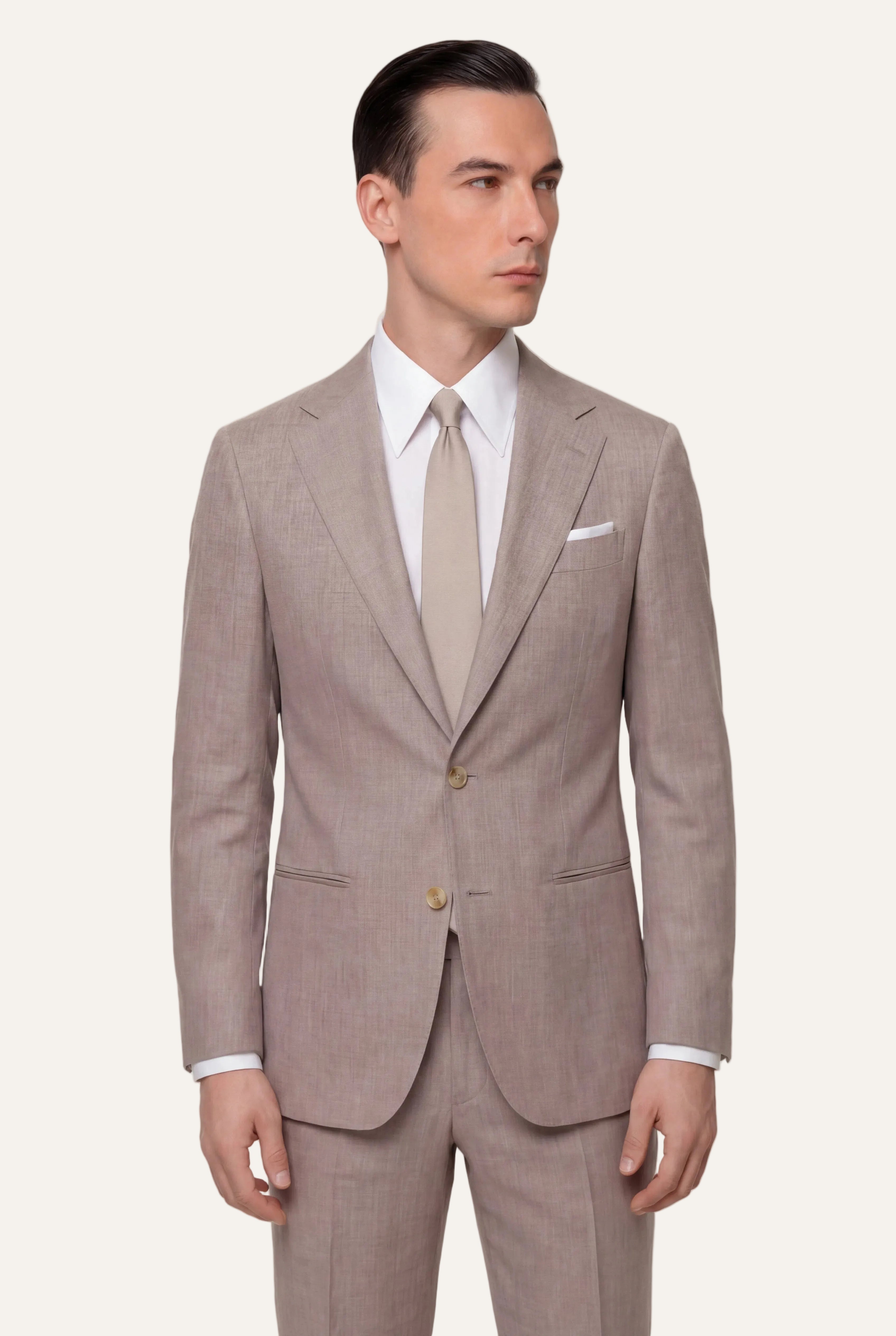 Zane Barläs Oxford Beige Suit — editorial front view on model