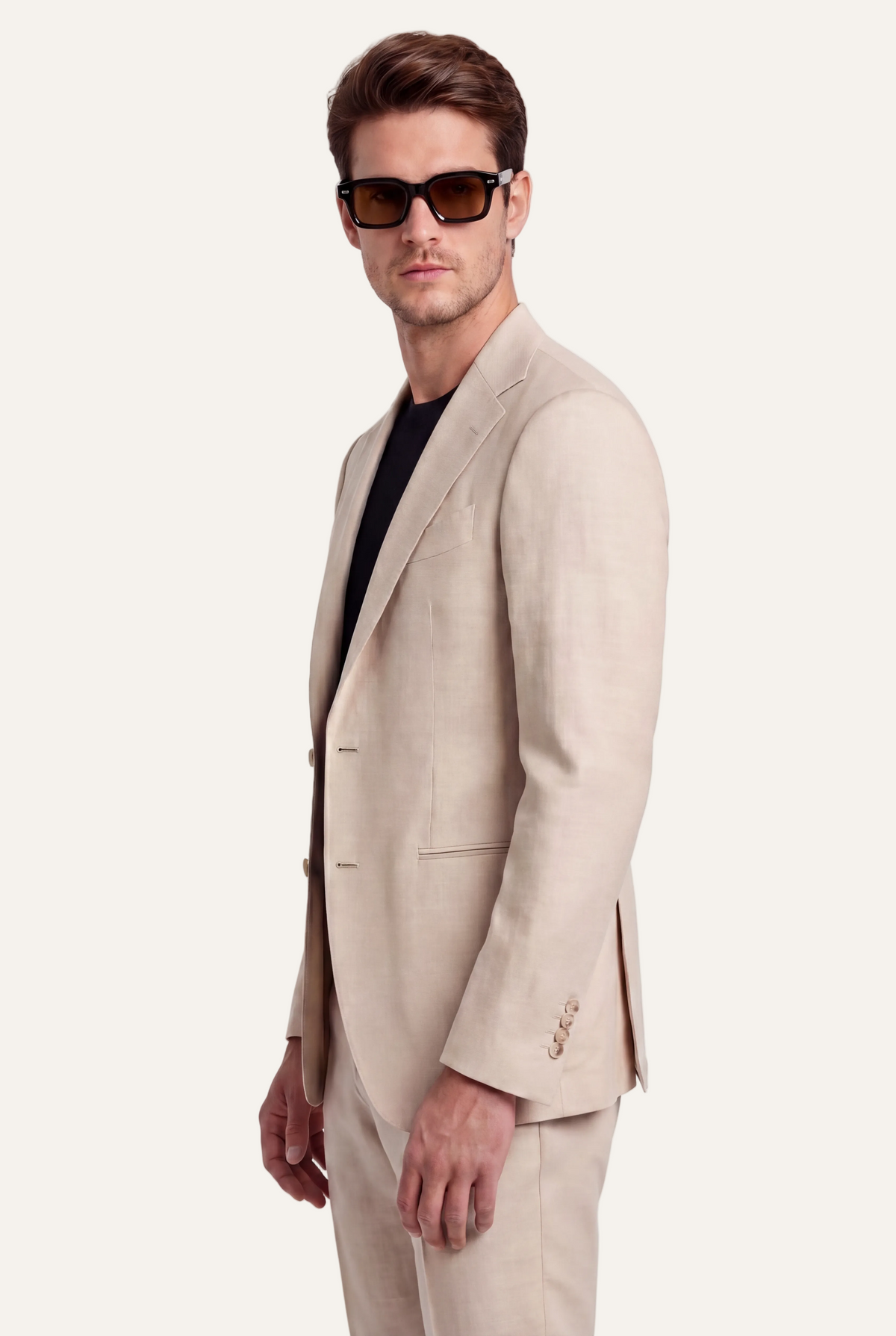 Zane Barläs Oxford Beige Suit — side view tailored silhouette on model