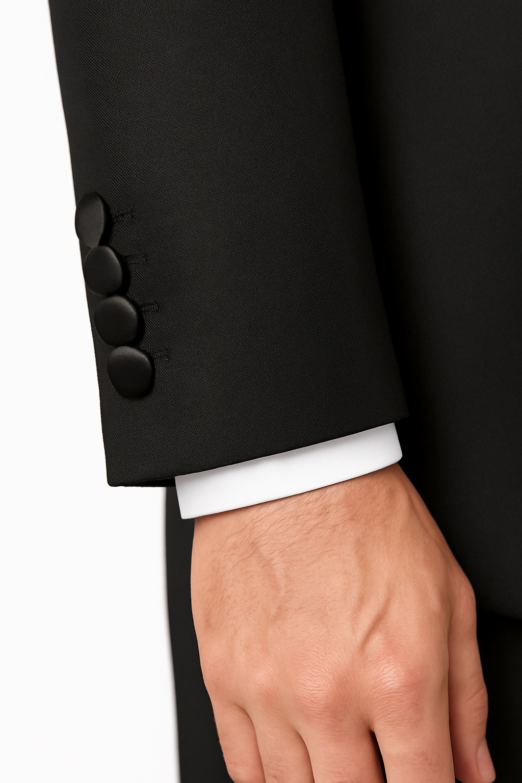 Close-up of satin silk-covered button on black tuxedo