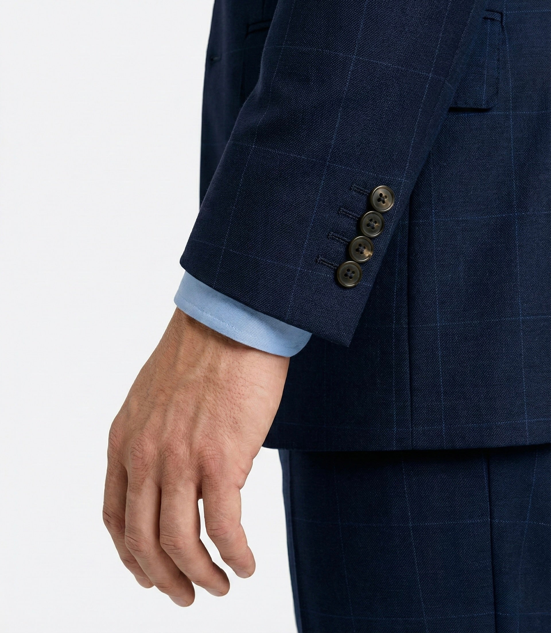 Zane Barläs functional horn buttons, windowpane suit sleeve detail