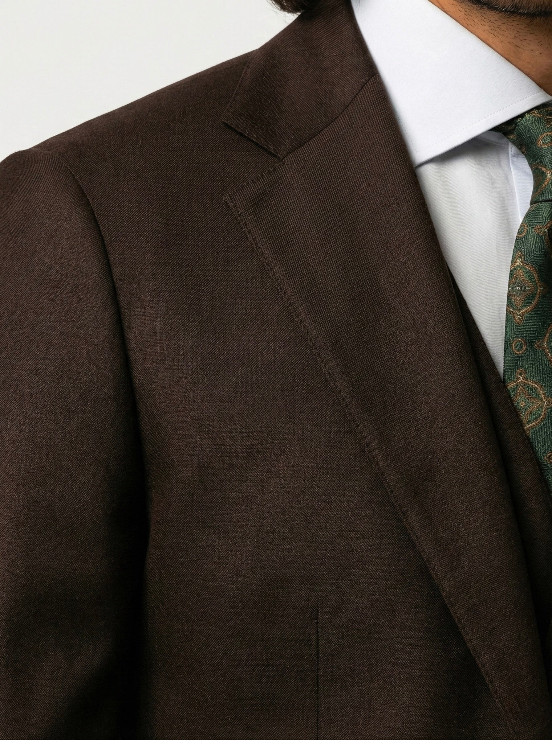 Zane Barläs Oxford Brown Plain Suit, notch lapel detail close-up Italian wool
