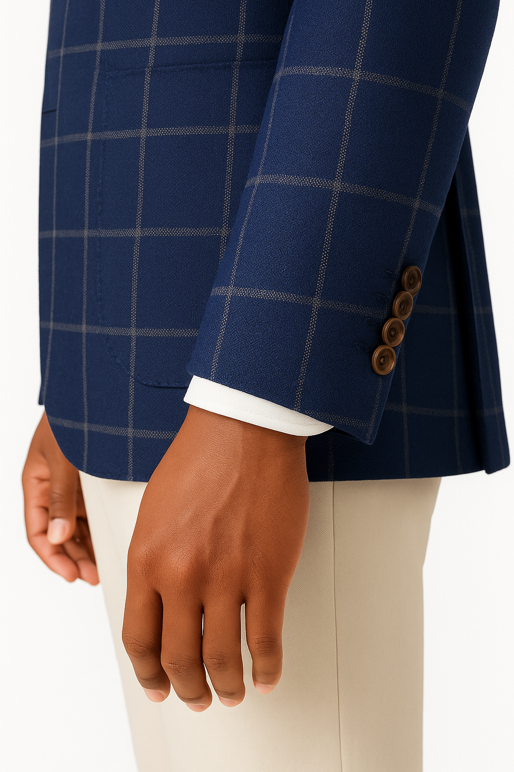 Sleeve close-up showing horn buttons and grey windowpane pattern