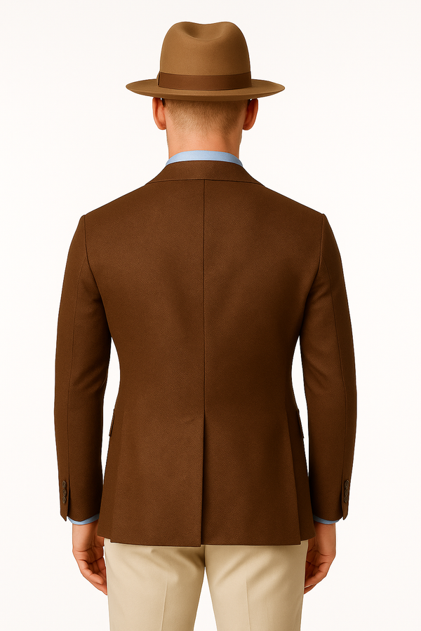 Rear view showing double vents of brown wool safari blazer