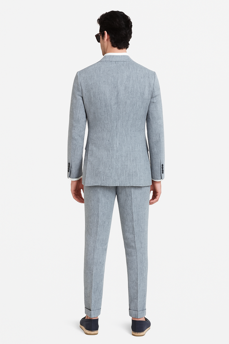 Rear view showing twin vents of grey linen double-breasted suit