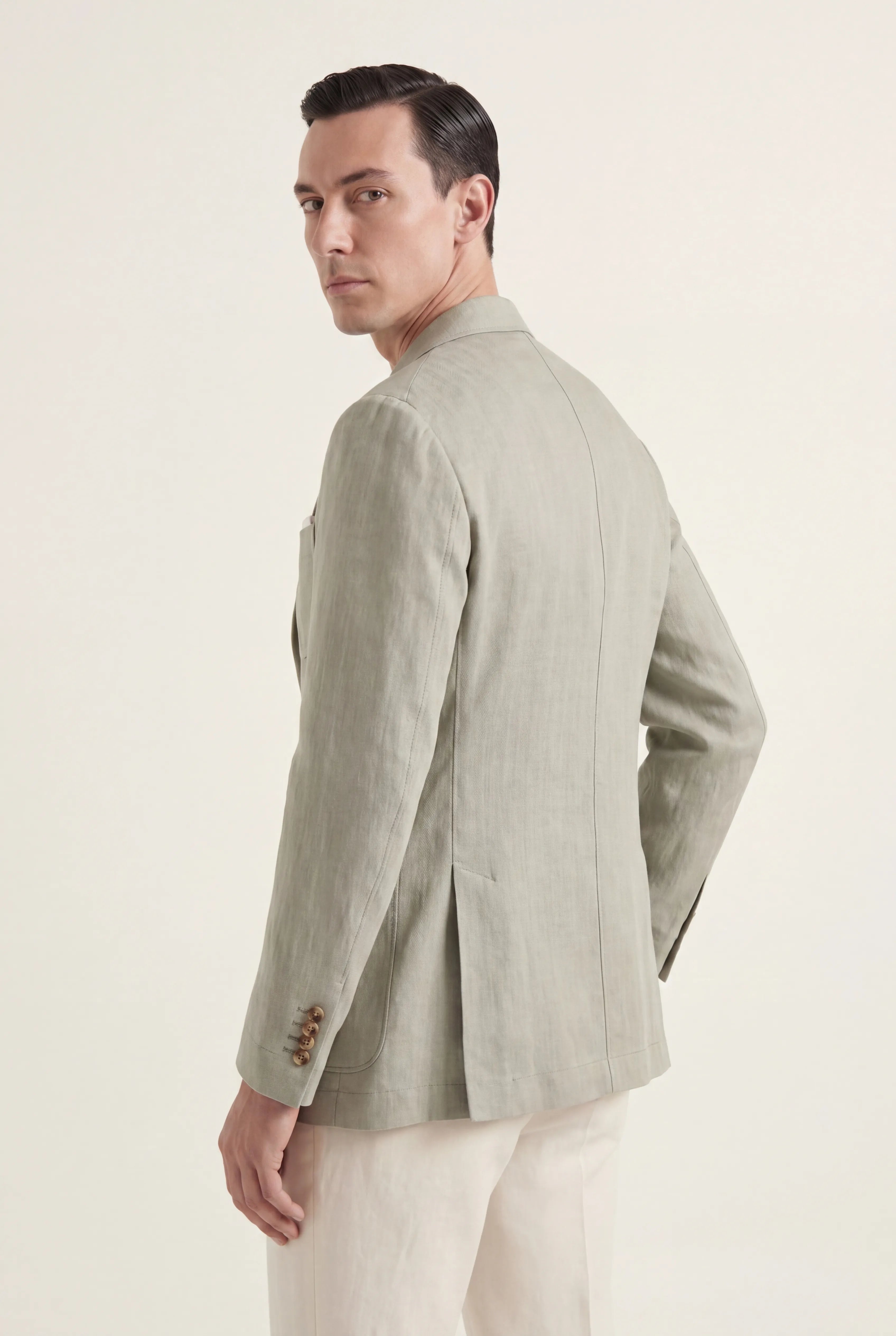 Zane Barläs Sage Linen Herringbone Jacket. Back view clean tailored silhouette